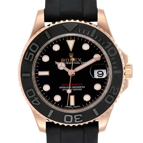 rolex watch with rubber strap.